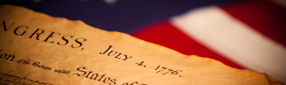 Declaration of Independene on a flag background