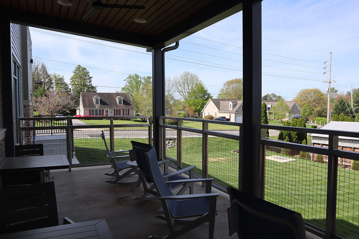 The Outside Deck at Middletown featuring seating and lovely views of the town
