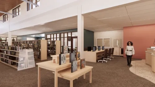 a rendering of the interior showing a customer in the book stacks with a study room in the background